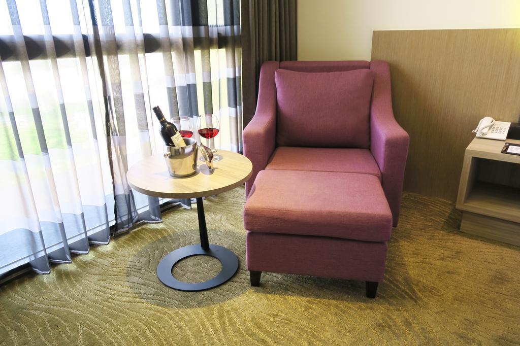 ลุค รอยัล รีสอร์ต Hotel นครเจียอี้ ภายนอก รูปภาพ A chair with a footrest